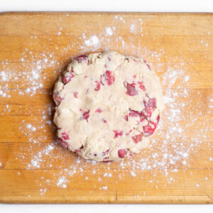 Patting the scone dough into a disc will lend itself nicely to creating even slices.