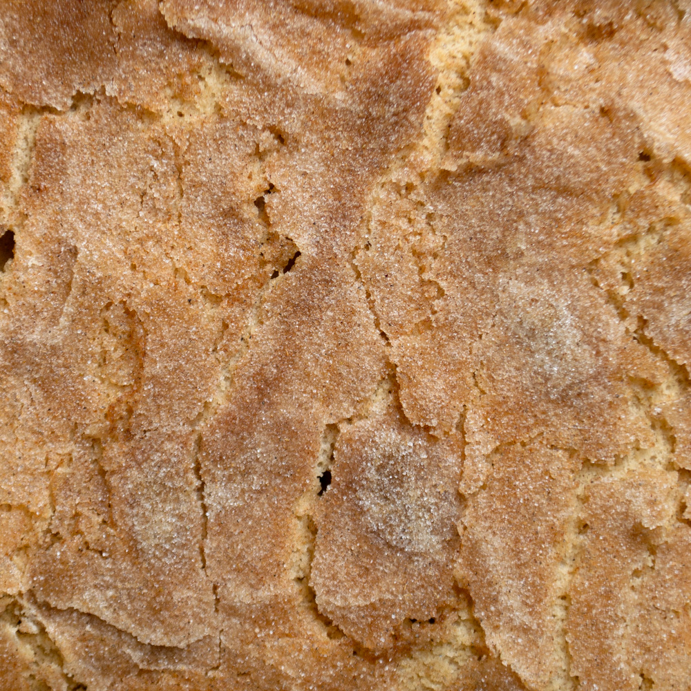 The beautiful cardamom sugar top that cracks into sugared pieces as it cools and settles.