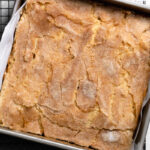 Warm and moist cardamom coffee cake with a crackled cardamom sugar top.