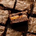 Salty and gooey dulce de leche makes the perfect brownie center.