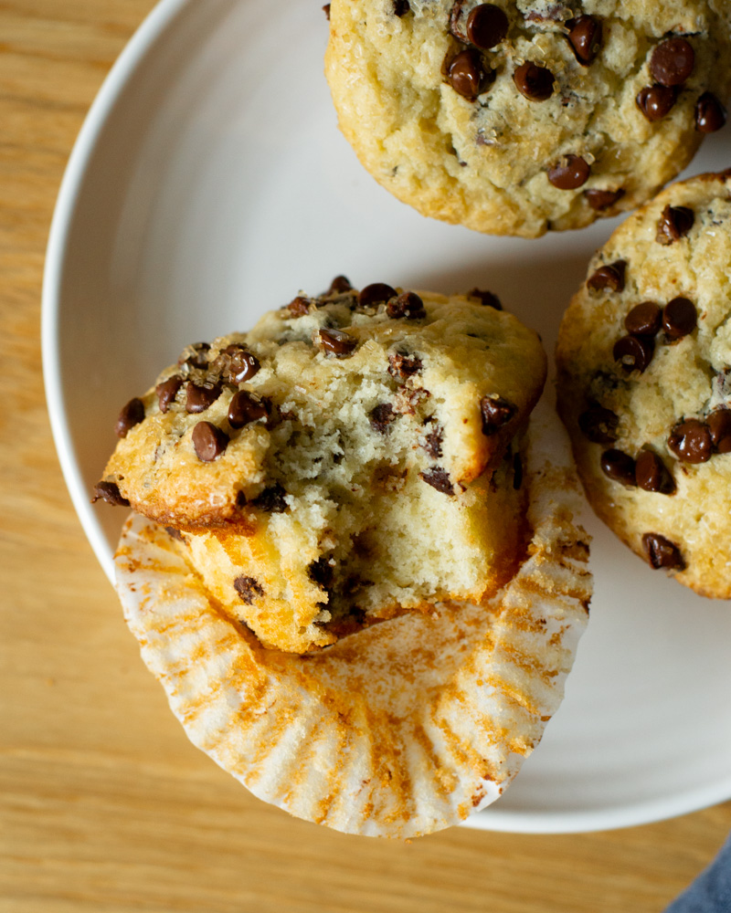 Fluffy, moist chocolate chip muffins with mini chocolate chips and topped with crunchy turbinado sugar. The perfect sweet breakfast or brunch!