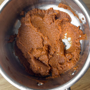 100% pumpkin puree and pumpkin pie spice blend before getting cooked down on the stove.
