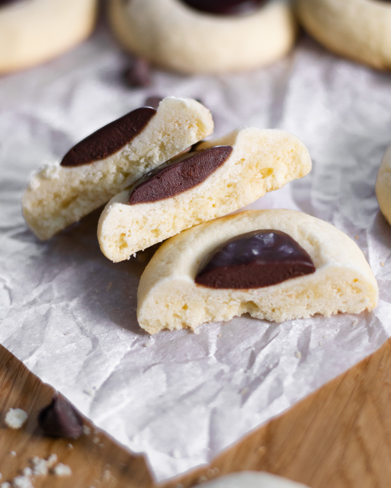 Vanilla thumbprint cookies with a silky-smooth chocolate ganache filling.